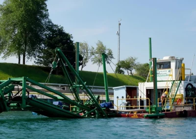 Mechanical or cutter-suction dredge removing sediment from underwater areas