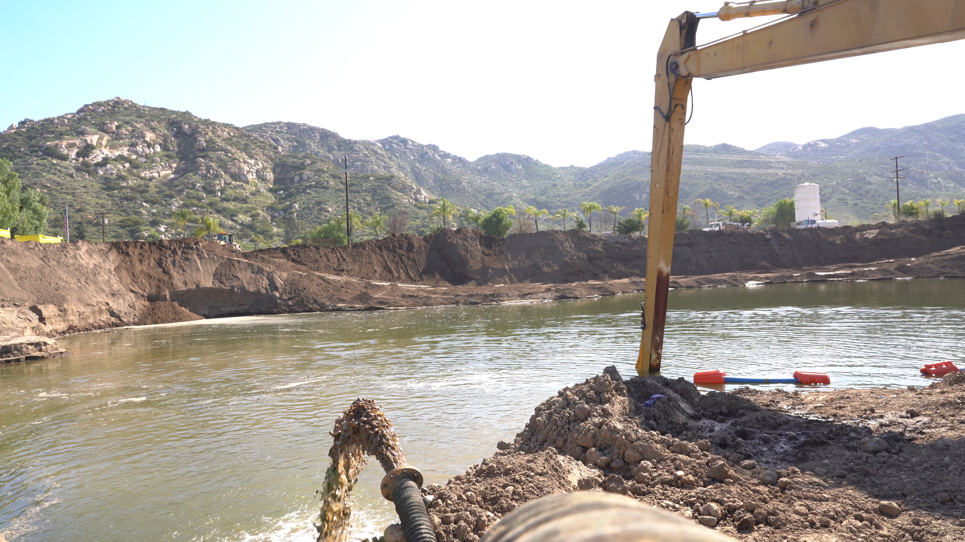EDDY Pump Discharging Sediment into Water at Construction Site EDDY Pump discharging sediment into a water body