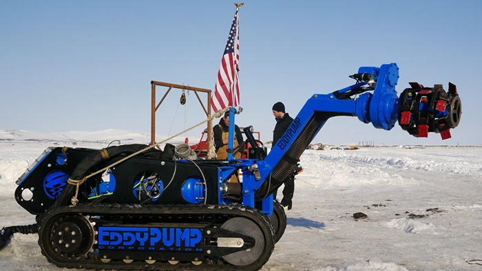 Blue EDDY PUMP Remote Operated Submersible Dredge (ROV) in a snowy environment