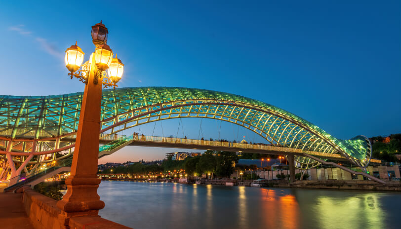 Tbilisi's iconic bridges blend architectural grace, weaving charm into the city's fabric