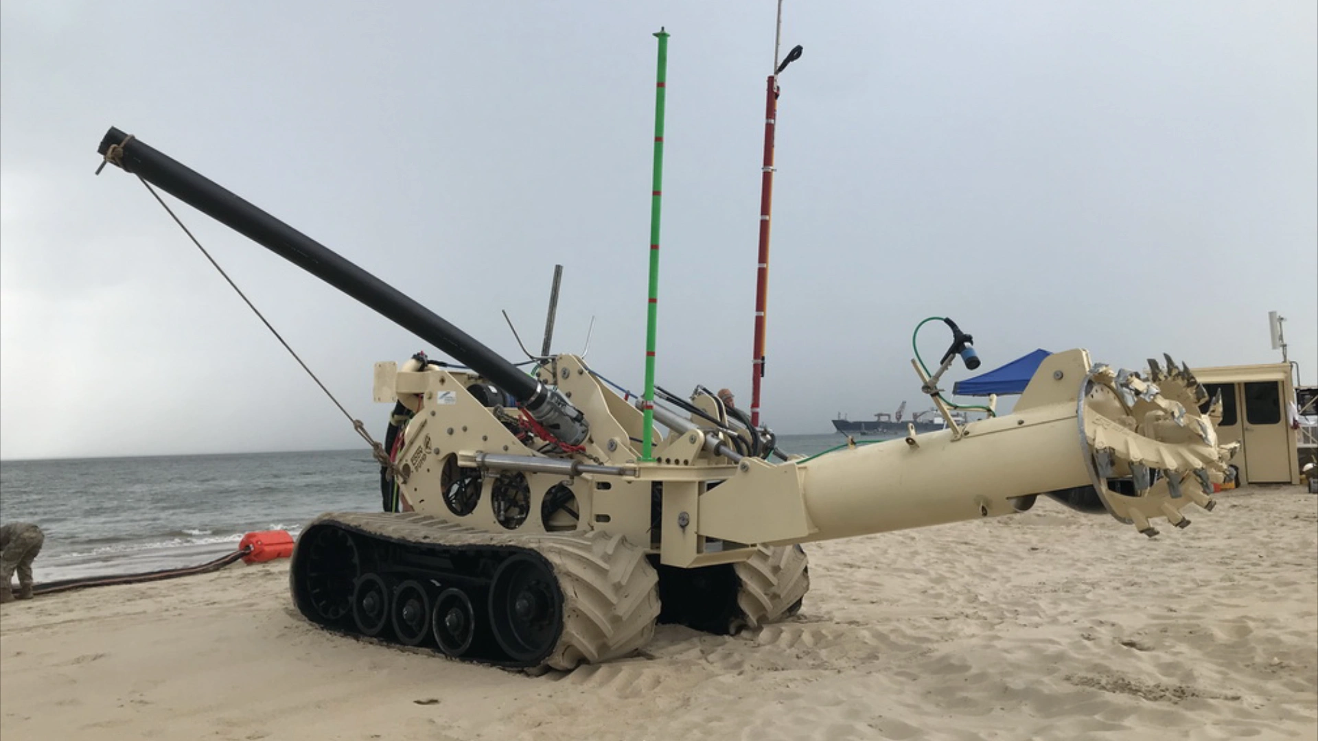 Remote-Operated Submersible Dredge Pump at the shore ROV submersible dredge pump on shoreline deployment