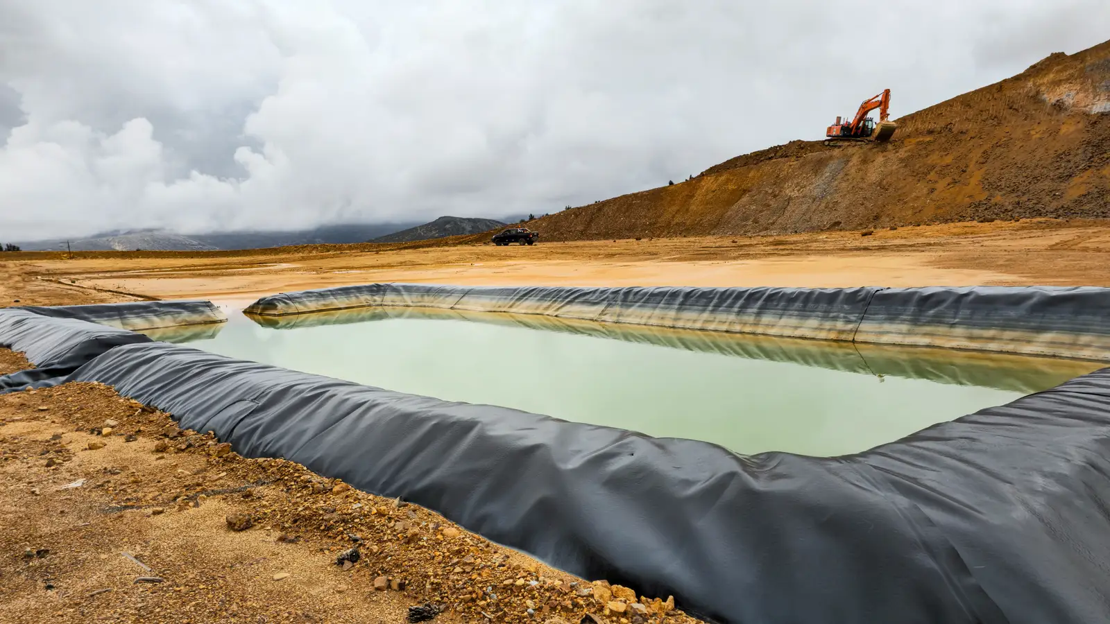 Mine Tailings Pond Challenge Mining tailings pond with heavy sediment buildup requiring reliable dredging and high solids slurry removal without liner damage