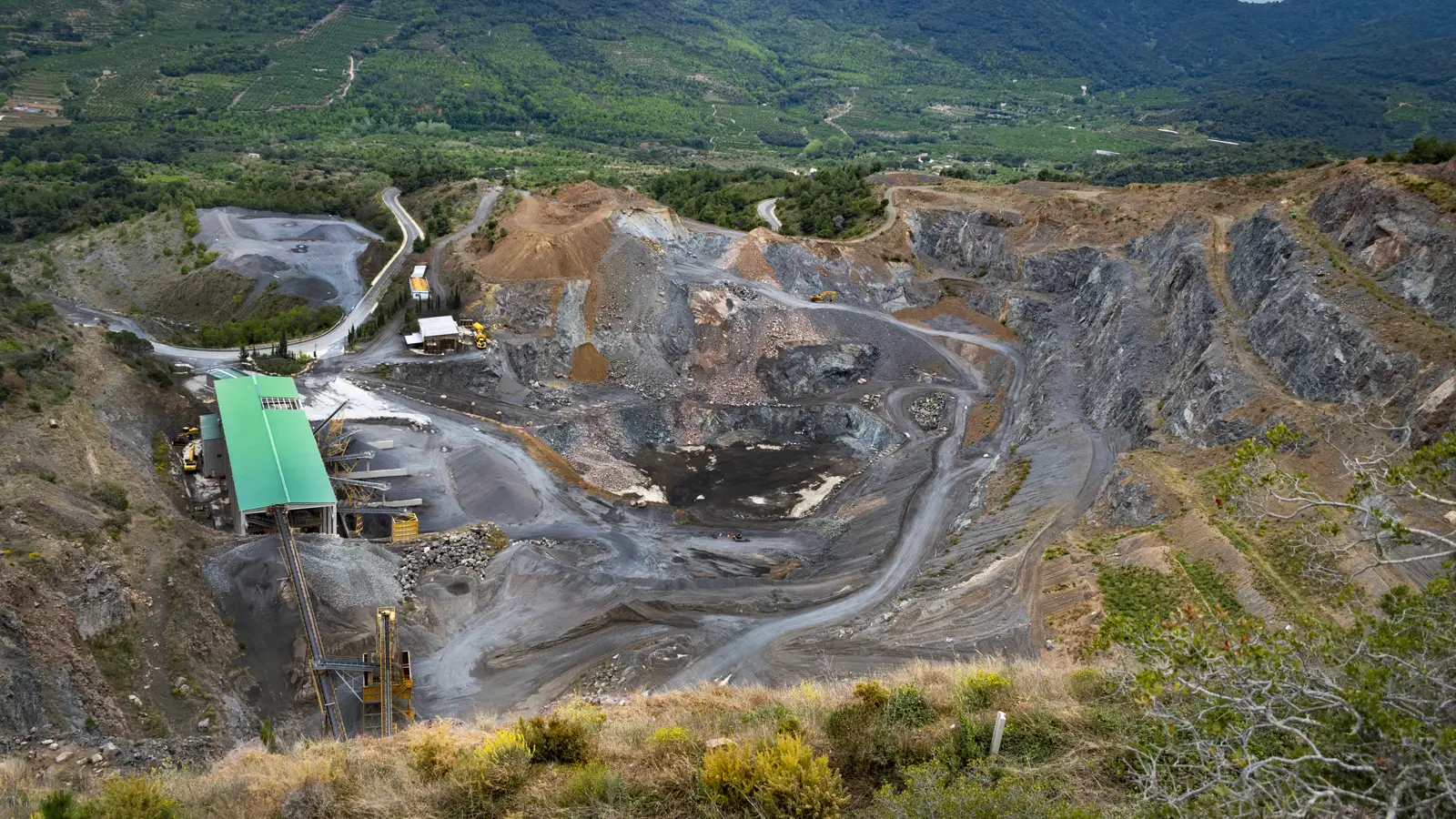 Mining Tailings Transfer Problem Copper mining tailings pond with abrasive slurry causing centrifugal pump clogging, wear, and costly downtime in mining operations